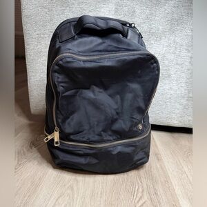 Lululemon Athletica Black Backpack with Gold Accents